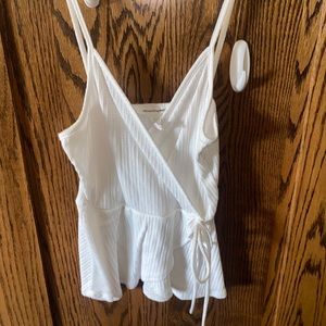 Caution to the wind white tank top